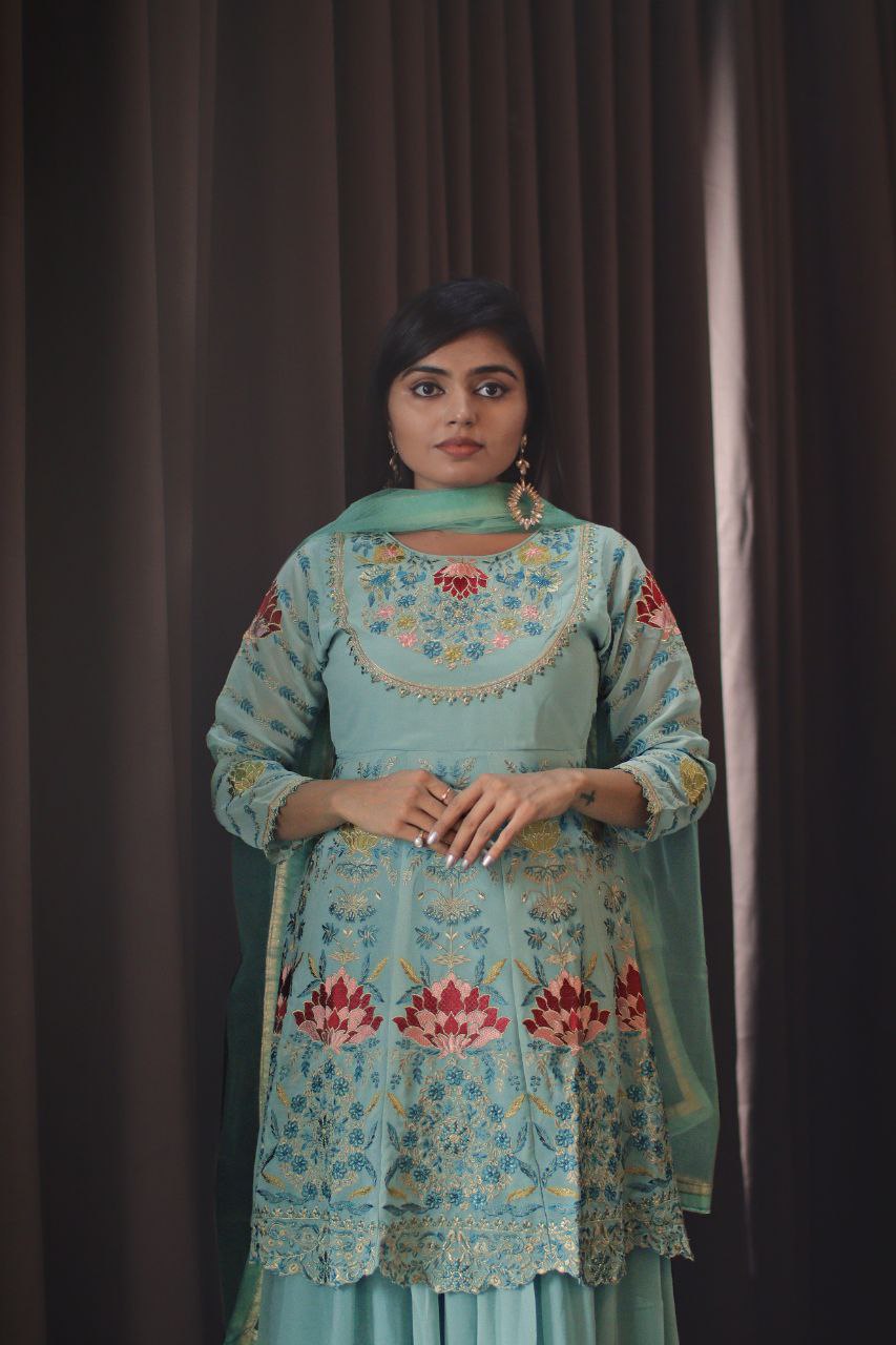 Sea Blue Faux Georgette Stitched Top With Stitched Faux Georgette Bottom and Net Dupatta Full Sleeve Embroidered A-line Top