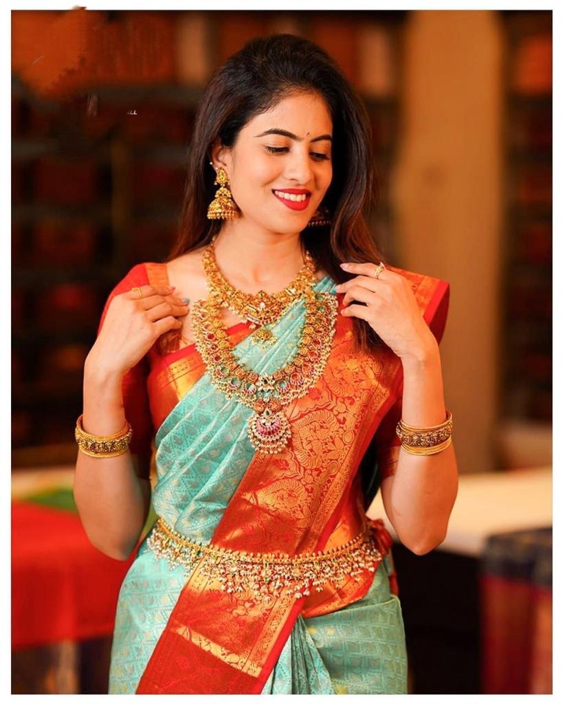 Pista_Orange Women Kanjivaram Zari Woven Banarasi Silk Saree with Unstitched Contrast Blouse Piece