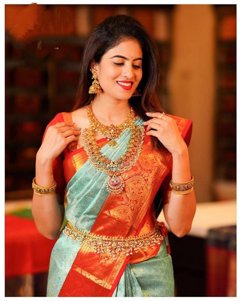 Pista_Orange Women Kanjivaram Zari Woven Banarasi Silk Saree with Unstitched Contrast Blouse Piece