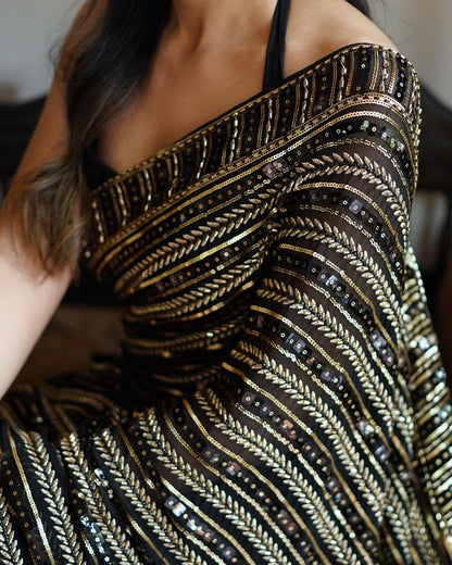 Bollywood glamour with our Dazzling Diva saree a masterpiece crafted from premium 60-gram heavy Georgette fabric
