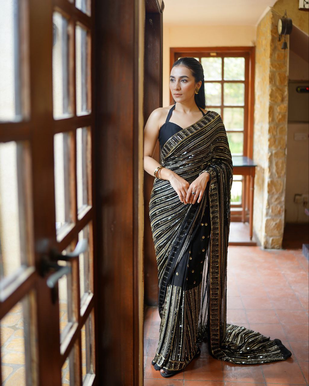 Bollywood glamour with our Dazzling Diva saree a masterpiece crafted from premium 60-gram heavy Georgette fabric
