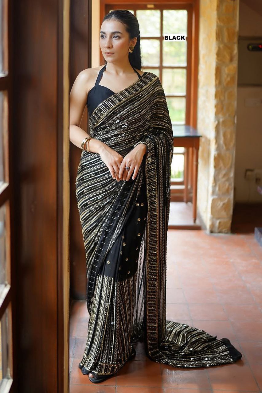 Bollywood glamour with our Dazzling Diva saree a masterpiece crafted from premium 60-gram heavy Georgette fabric