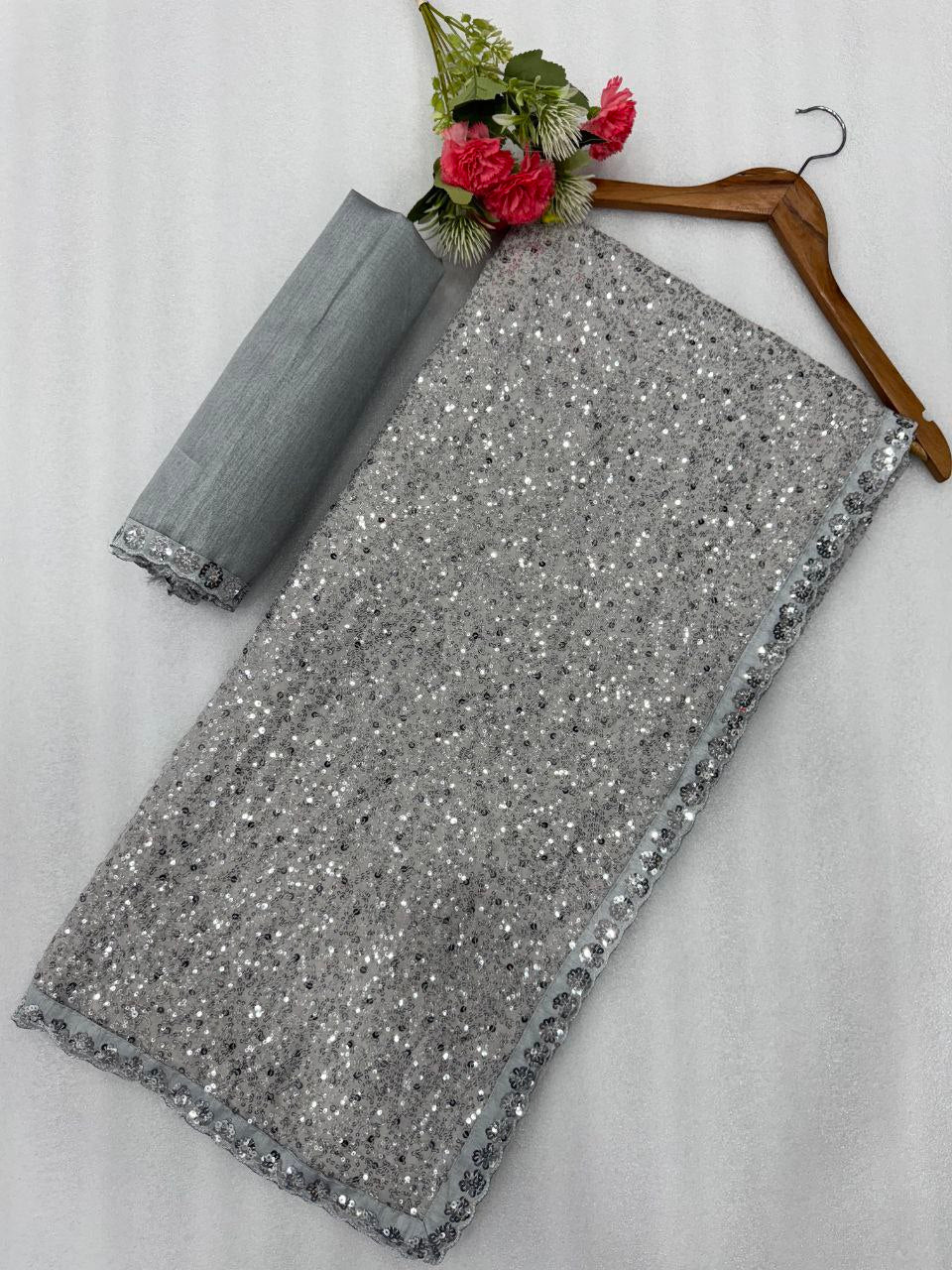 New Bollywood Blockbuster Faux Georgette Saree with Heavy Khichdi Sequin Embroidery & Cutwork Lace Border