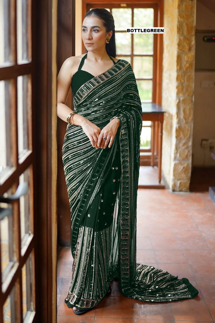 Bollywood glamour with our Dazzling Diva saree a masterpiece crafted from premium 60-gram heavy Georgette fabric
