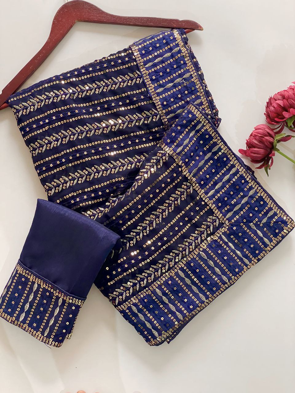 Bollywood glamour with our Dazzling Diva saree a masterpiece crafted from premium 60-gram heavy Georgette fabric