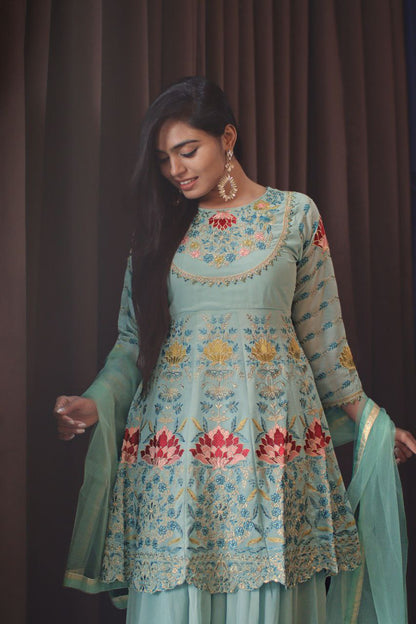 Sea Blue Faux Georgette Stitched Top With Stitched Faux Georgette Bottom and Net Dupatta Full Sleeve Embroidered A-line Top