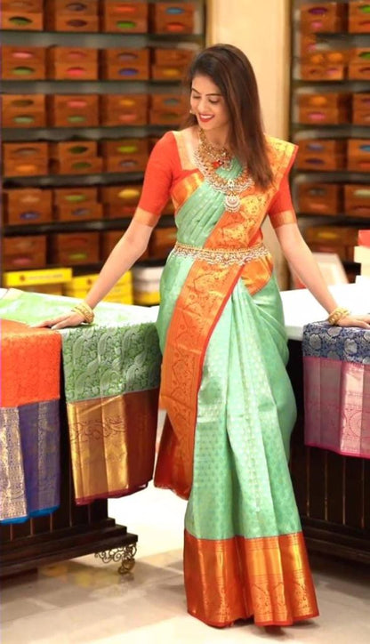 Pista_Orange Women Kanjivaram Zari Woven Banarasi Silk  Saree with Unstitched Contrast Blouse Piece