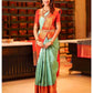 Pista_Orange Women Kanjivaram Zari Woven Banarasi Silk  Saree with Unstitched Contrast Blouse Piece