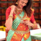 Pista_Orange Women Kanjivaram Zari Woven Banarasi Silk  Saree with Unstitched Contrast Blouse Piece