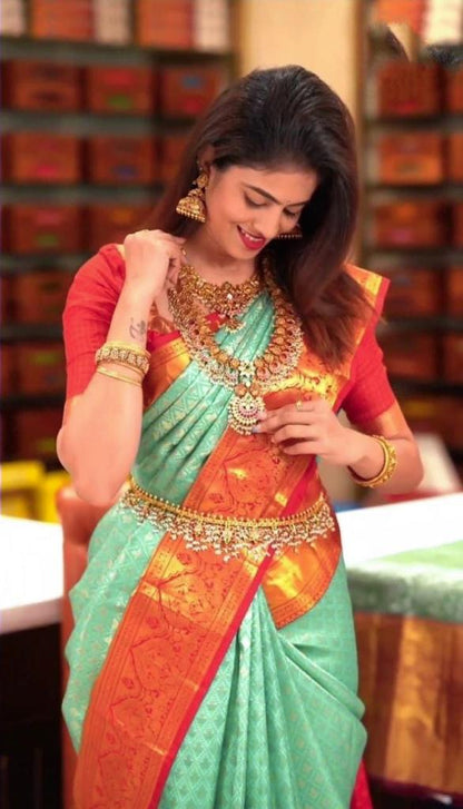 Pista_Orange Women Kanjivaram Zari Woven Banarasi Silk  Saree with Unstitched Contrast Blouse Piece