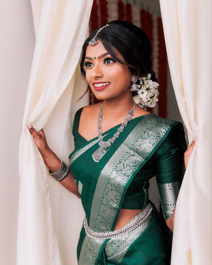 Sizzling Dark Green Soft Banarasi Silk Saree With Shining Silver Border And Beautiful Blouse Piece