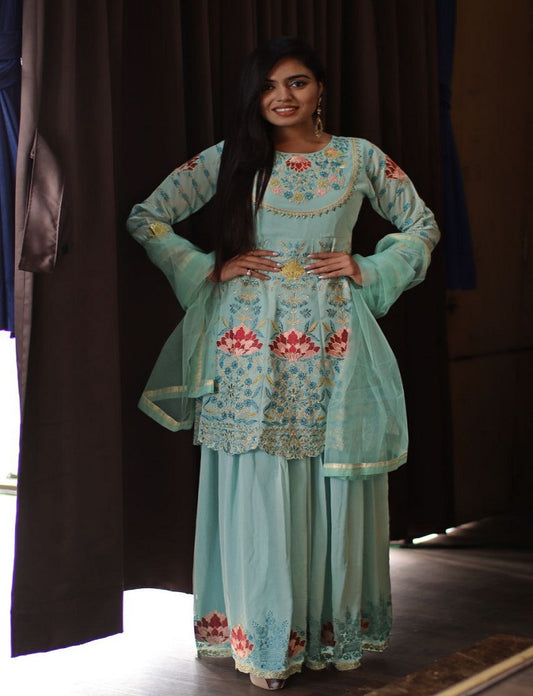 Sea Blue Faux Georgette Stitched Top With Stitched Faux Georgette Bottom and Net Dupatta Full Sleeve Embroidered A-line Top