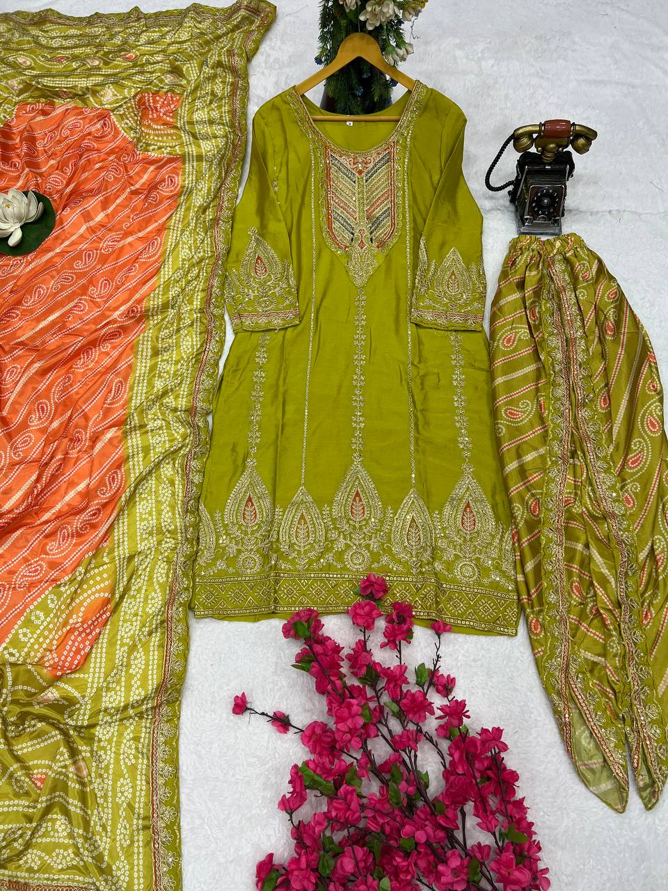 Elevate ethnic wardrobe with this exquisite Heavy Pure Chinon Silk Kurti Dhoti Set with Dupatta.